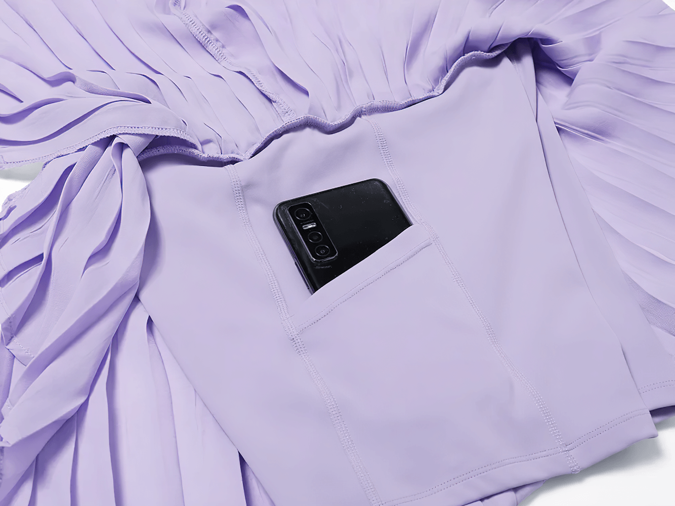 Lilac sleeveless tank and sports skirt set with pocket for phone, ideal for yoga and running, featuring quick-dry and breathable fabric.